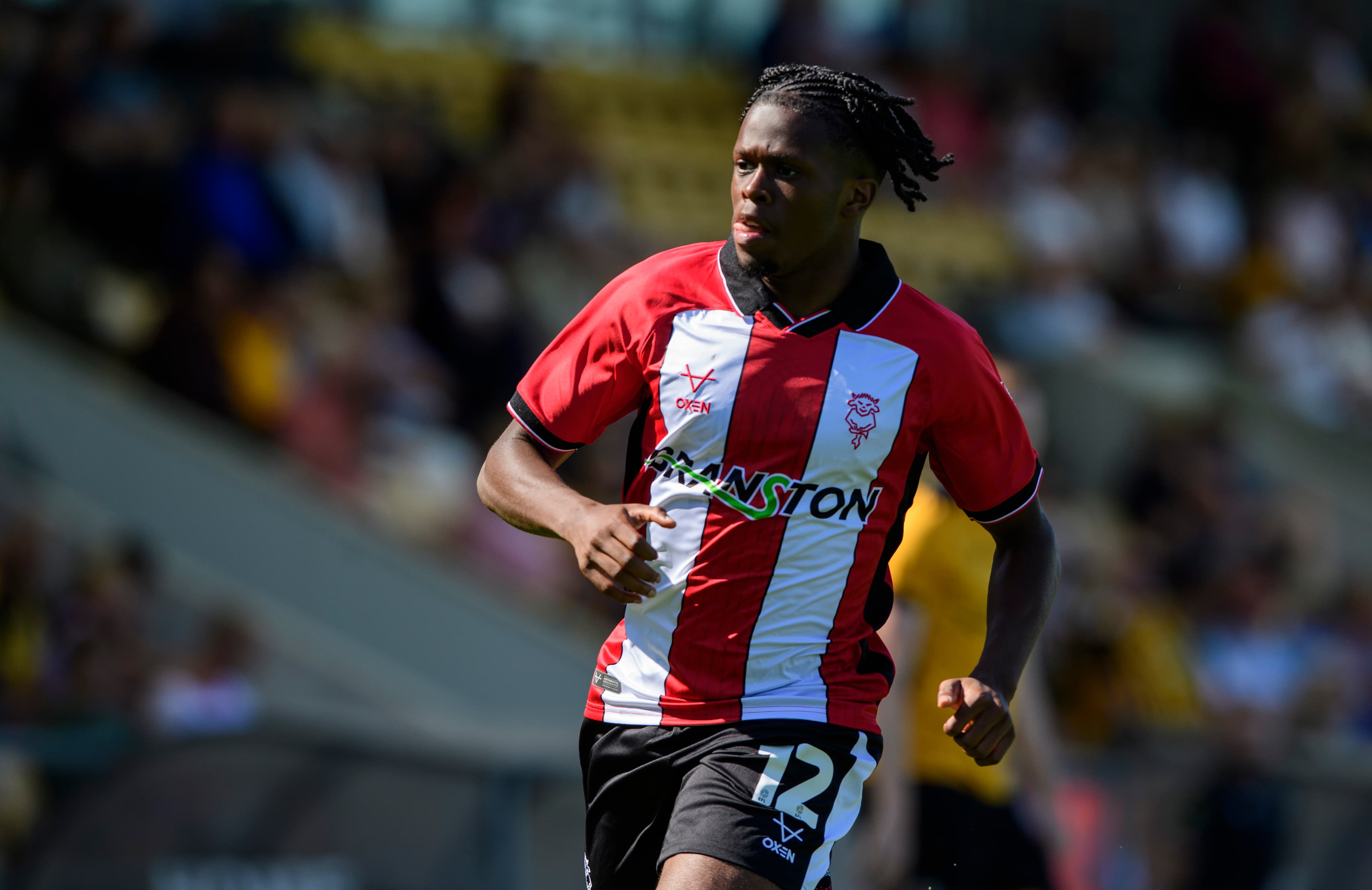 Okoro signs new deal with Imps